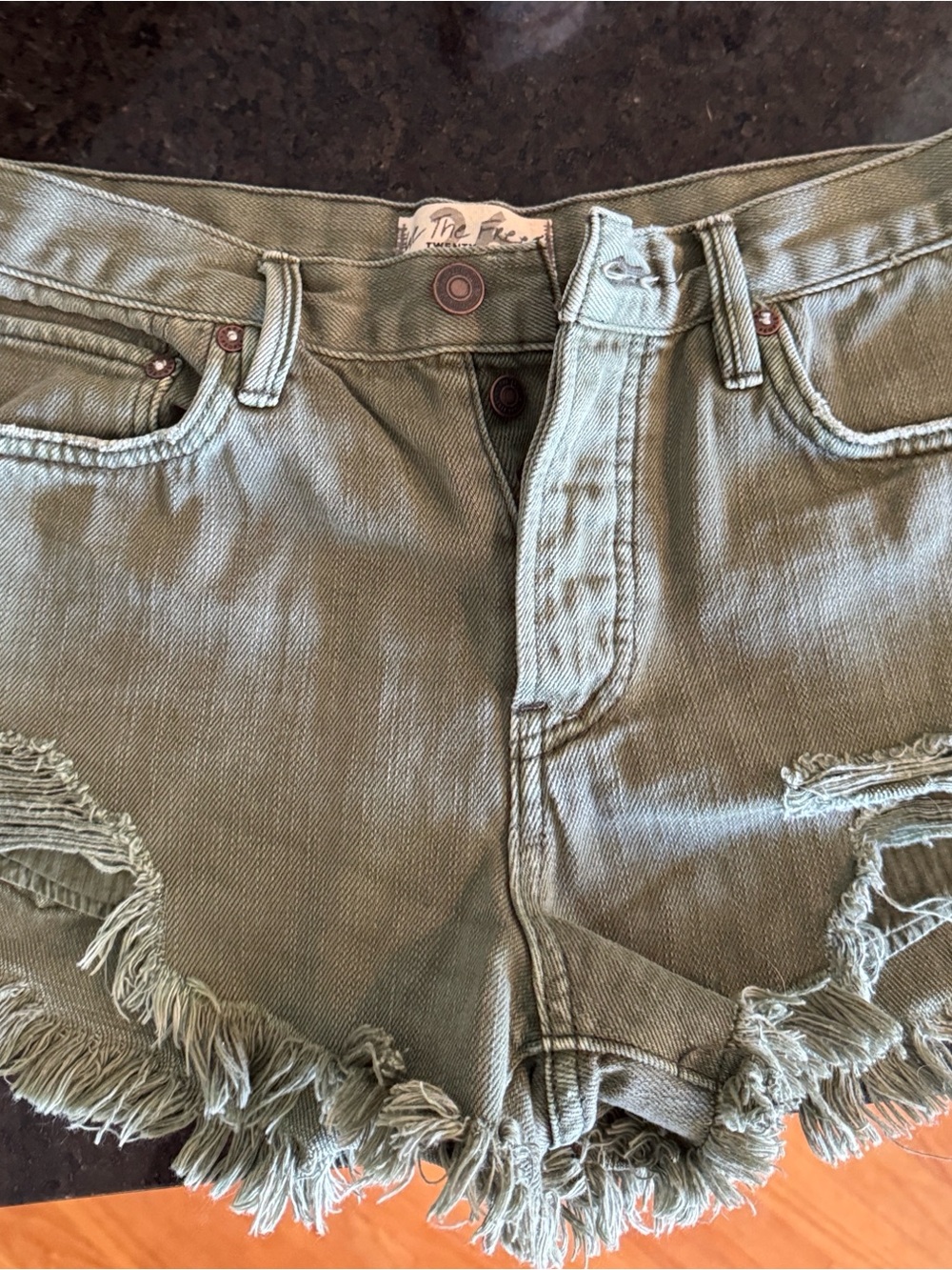 We The Free Olive Cutoff Distressed Denim Shorts